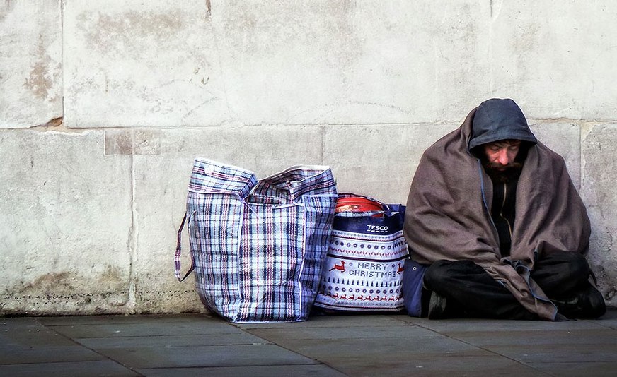 Homeless by a Wall